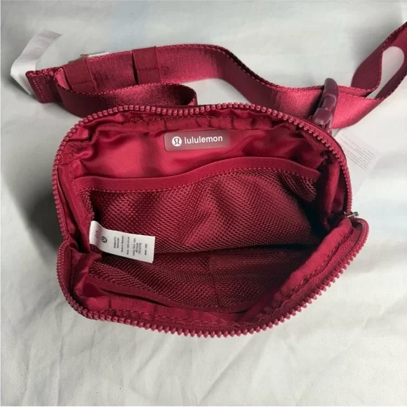 Lululemon “Wine Red” Cossbody Waist Belt Bag. Adjustable 1L - Picture 2 of 4
